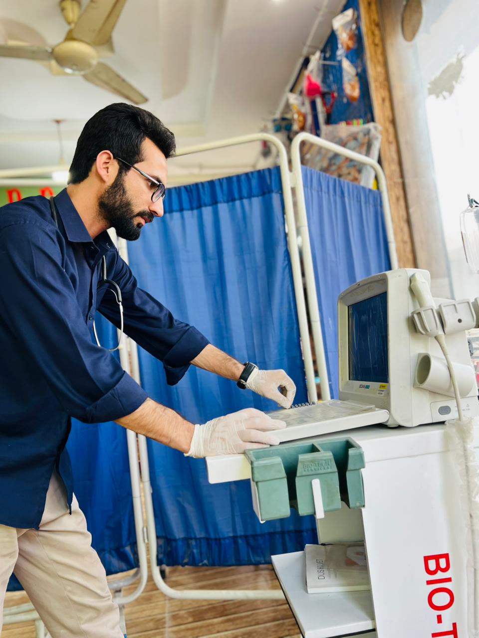 Dr Wajihur Rahman at ultrasound machine with stethoscope