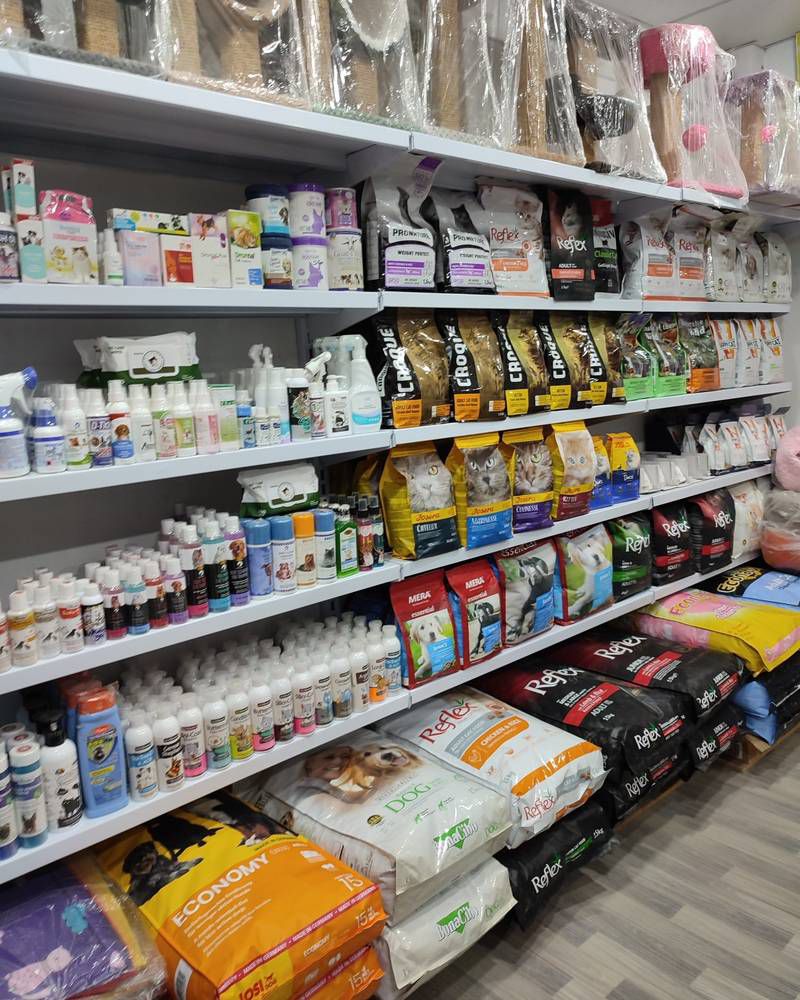 Well-stocked shelves of premium pet food brands
